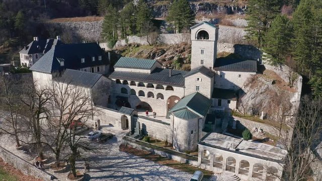 Cetinje Monastery is a Christian monastery of the Serbian Orthodox Church in Montenegro, founded c. 1484 by Prince Ivan Crnojevic of Zeta. Aerial footage on a sunny day.