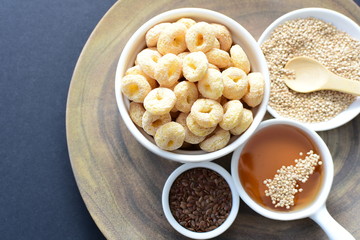 Quinoa cereal, accompanied by seeds and honey