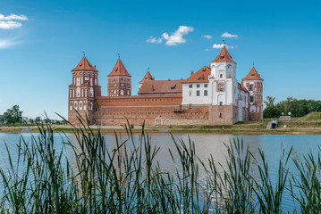 Fototapeta na wymiar Mir Castle Complex in Belarus with lake