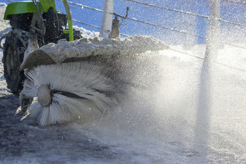 special machine for snow removal cleans the road