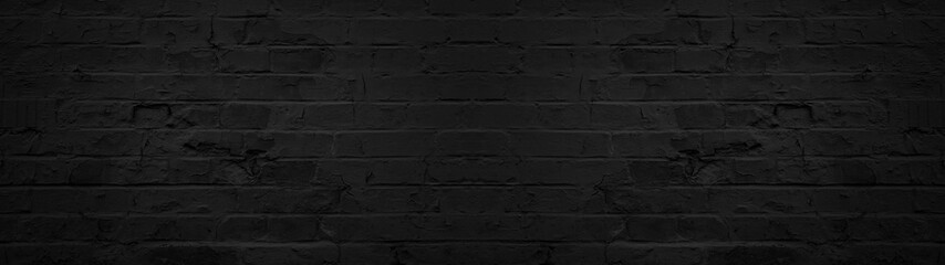 Dark black anthracite damaged rustic brick wall texture banner panorama