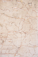 Old yellow cracked stone background. Top view