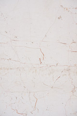 Old white cracked stone background. Top view