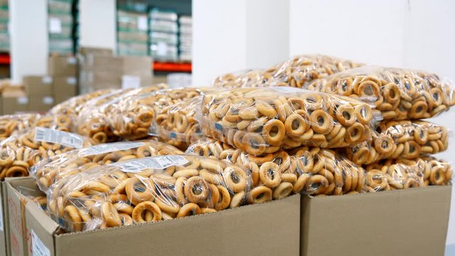 Packaged vanilla bagels. Boxes with bagels.