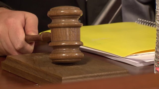 Close-up of wood gavel hit