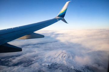 Obraz premium airplane wing and landscape