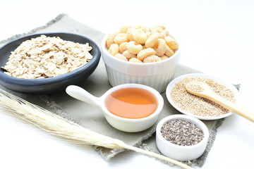 Oatmeal, Quinoa cereal accompanied by seeds and honey