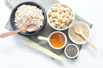 Oatmeal, Quinoa cereal accompanied by seeds and honey