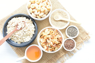 Oatmeal, Quinoa cereal accompanied by seeds and honey