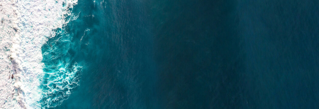 Aerial view to waves in ocean Splashing Waves. © AlenKadr