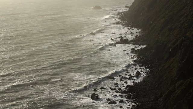 Ocean cliffs bluffs during golden hour / shoreline