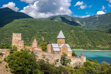 Ananuri in Georgia, fortress with orthodox monastery and reservoir on a hill over water reservoir 
