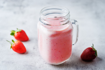 Strawberry banana smoothies in glass