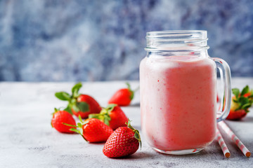 Strawberry banana smoothies in glass