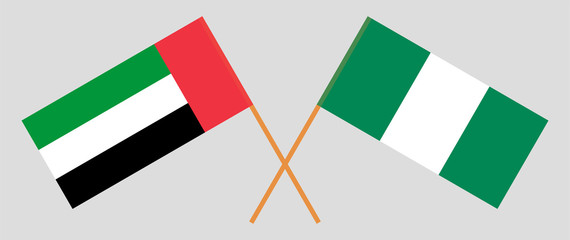 Crossed flags of Nigeria and the United Arab Emirates