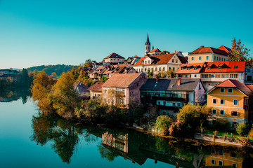 Fototapeta na wymiar Novo mesto old town, view from the bridge over Krka river, Novo mesto, Dolenjska region, Slovenia.