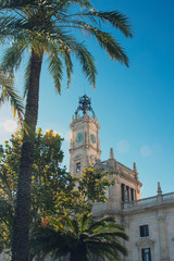 Fototapeta na wymiar The beautiful town hall rises in Piazza Ayuntamiento de Valencia on a bright sunny day. Valencia, Spain. The trip.