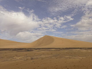 summer desert landscape on a warm sunny day from Maspalomas dunes on the Spanish island of Gran...