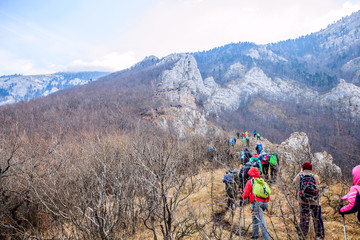Fototapeta premium Group Of Mountaineers Trekking Winter Mountain Landscape Hiking Healthy Activity