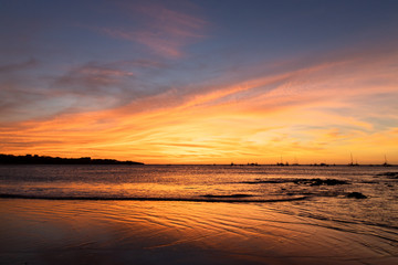 Fototapeta na wymiar Bright beach sunset in Tamarindo, Costa Rica
