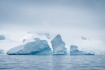 Fototapeta na wymiar Antarctic glacier in the snow. Beautiful winter background.