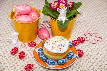 Easter eggs. Religion holiday. Chicken eggs in yellow bucket