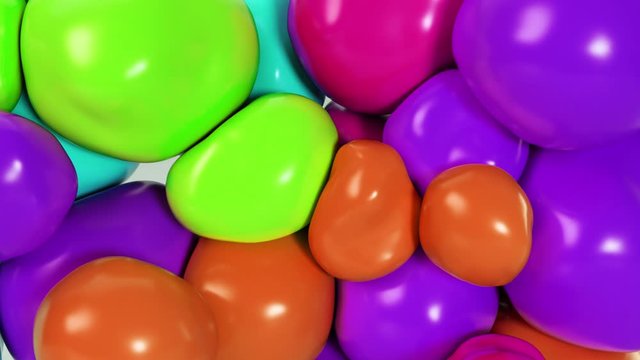 Abstract multicolored squishy balls move and interact with each other with internal pressure trying to find a place for themselves.