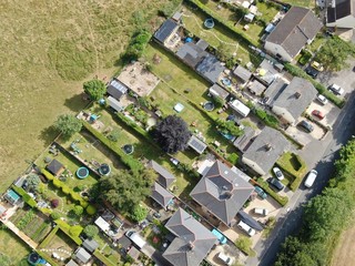 an aerial view of countryside and the edge of a town , Corfe Mullen,Dorset