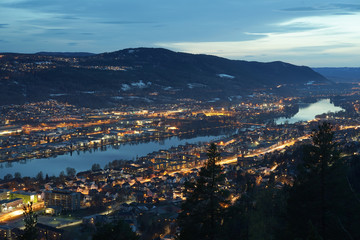 Evening view of the city situated on both sides of river.