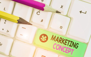 Text sign showing Marketing Concept. Business photo text the strategy that firms adopt to satisfy...