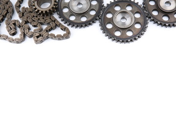 old gears and engine chain on a white background with copy space