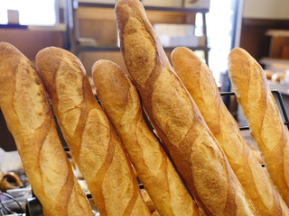 Many French breads on display at stores