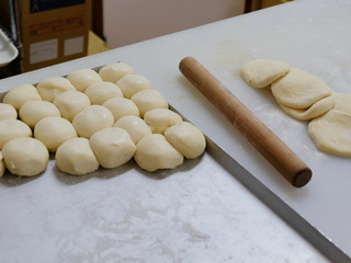 Fototapeta na wymiar Forming bread dough