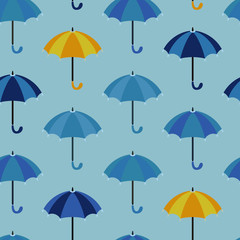 Seamless pattern with open umbrellas. Rows of umbrellas in shades of blue and sometimes yellow. Vector illustration, flat cartoon design. Umbrella with rounded handle. Texture for fabric, baby clothes