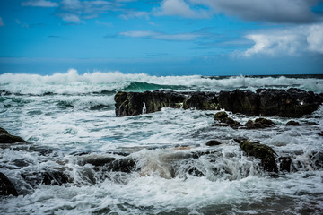 waves crashing on rocks
