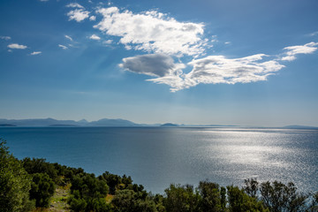 Relaxing colorful seascape with view on mountains of Peloponnese, Greece