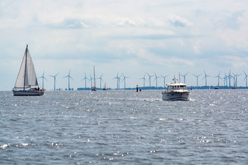 Weekend sailing on small jacht boat on Ijsselmeer in North Holland, Netherlands