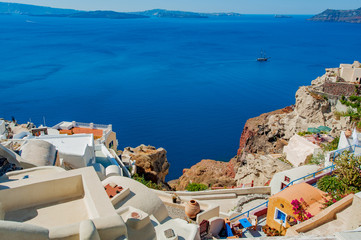 The village of Oia, overlooking with a spectacular view of the Aegean sea. Santorini, Cyclades islands, Greece, Europe