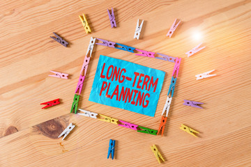 Conceptual hand writing showing Long Term Planning. Concept meaning establishing goals that you...