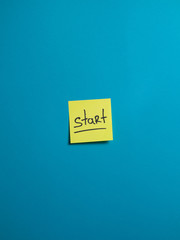 yellow sticker that says start. motivating banner.