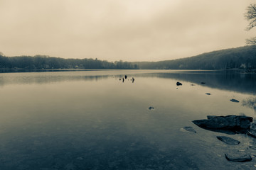 Winter reflections on a stark lake