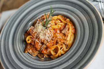 pasta with tomato sauce with chicken served for lunch