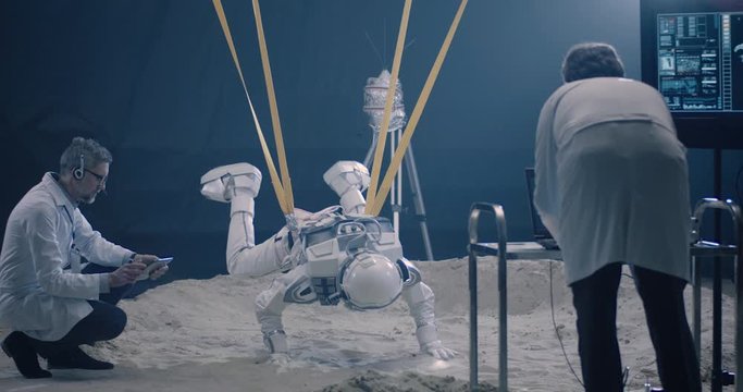 Astronaut and scientists testing for zero-gravity