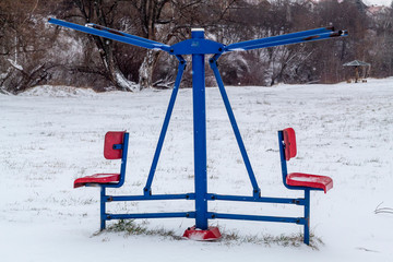 Exercise Device in Outdoor Gym Covered With Snow