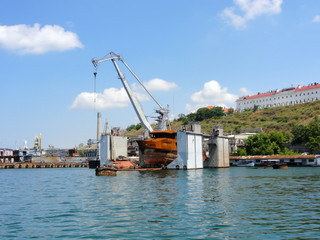 Sea boats, lifeboats. Sailboats. Repair and loading of ships.Sea.Submarine.