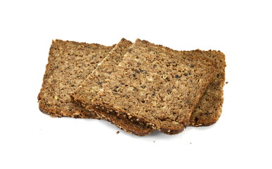 Slices of wholemeal dark bread isolated on a white background in close-up (high details)