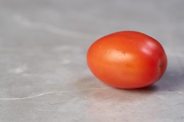 cherry tomatoes on tile table