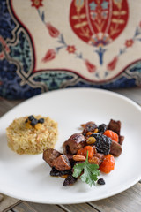 Turkish Lamb Meat, Dried Fruit and Almond Stew with Bulgur as Side Dish, Kuzu Mutancana.