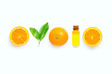 Natural citrus oil with fresh orange fruit and green leaves  on white background. High vitamin C.