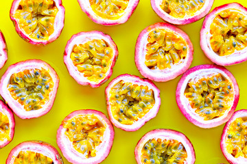 Passion fruit on yellow background.
